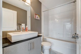 Photo 20: 7 51 West Coach Manor SW in Calgary: West Springs Row/Townhouse for sale : MLS®# A2051975