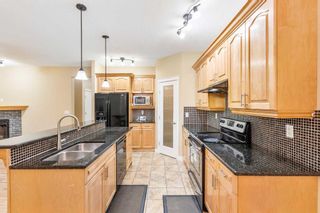 Photo 11: 23 Taracove Estate Drive NE in Calgary: Taradale Detached for sale : MLS®# A2124428