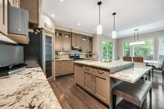 Photo 6: 7496 Springbank Way SW in Calgary: Springbank Hill Detached for sale : MLS®# A2053120