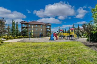 Photo 31: 4302 92 Crystal Shores Road: Okotoks Apartment for sale : MLS®# A1254415