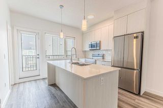 Photo 22: 304 101 Panatella Square NW in Calgary: Panorama Hills Row/Townhouse for sale : MLS®# A2131262