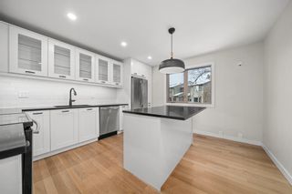 Photo 2: 178 Glamis Terrace SW in Calgary: Glamorgan Row/Townhouse for sale : MLS®# A2015537