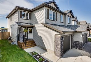 Photo 1: 2360 BAYWATER Crescent SW: Airdrie Semi Detached for sale : MLS®# A1025876