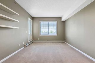 Photo 9: 408 8 Prestwick Pond Terrace SE in Calgary: McKenzie Towne Apartment for sale : MLS®# A2068292