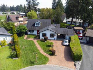 Photo 1: 19368 121 Avenue in Pitt Meadows: Central Meadows House for sale : MLS®# R2877930