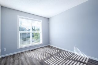 Photo 8: 727 101 Sunset Drive: Cochrane Row/Townhouse for sale : MLS®# A1245643