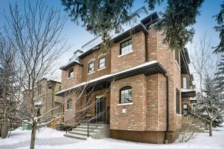 Photo 1: 54 34 Avenue SW in Calgary: Erlton Row/Townhouse for sale : MLS®# A2102467