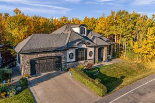Photo 1: 26 Wentwillow Lane SW in Calgary: West Springs Detached for sale : MLS®# A2075241