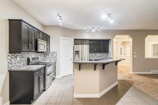 Photo 6: 323 Panamount Point NW in Calgary: Panorama Hills Detached for sale : MLS®# A1150248