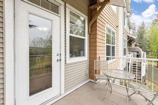 Photo 13: 46 Discovery Heights SW in Calgary: Discovery Ridge Row/Townhouse for sale : MLS®# A2050101