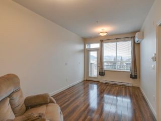 Photo 7: 301 8531 YOUNG Road in Chilliwack: Chilliwack Proper South Condo for sale in "The Auburn Residences" : MLS®# R2828765
