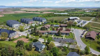 Photo 2: 18 Woodman Road in Wolfville: Kings County Multi-Family for sale (Annapolis Valley)  : MLS®# 202310319