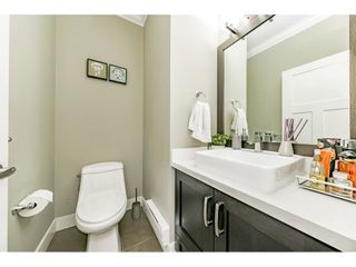 Photo 25: 21 14285 64 Avenue in Surrey: East Newton Townhouse for sale in "Aria Living" : MLS®# R2651145