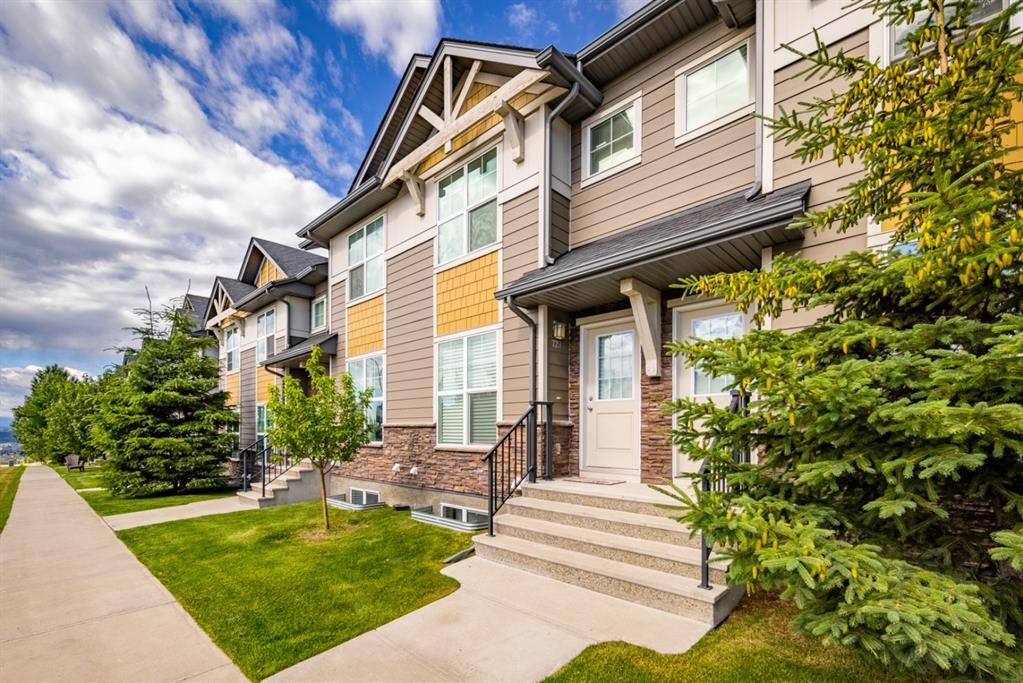 Main Photo: 727 101 Sunset Drive: Cochrane Row/Townhouse for sale : MLS®# A1245643