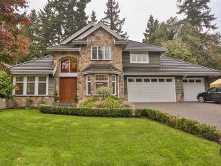 Photo 1: 935 DENNISON Avenue in Coquitlam: Coquitlam West House for sale in "WEST COQUITLAM" : MLS®# V1055925