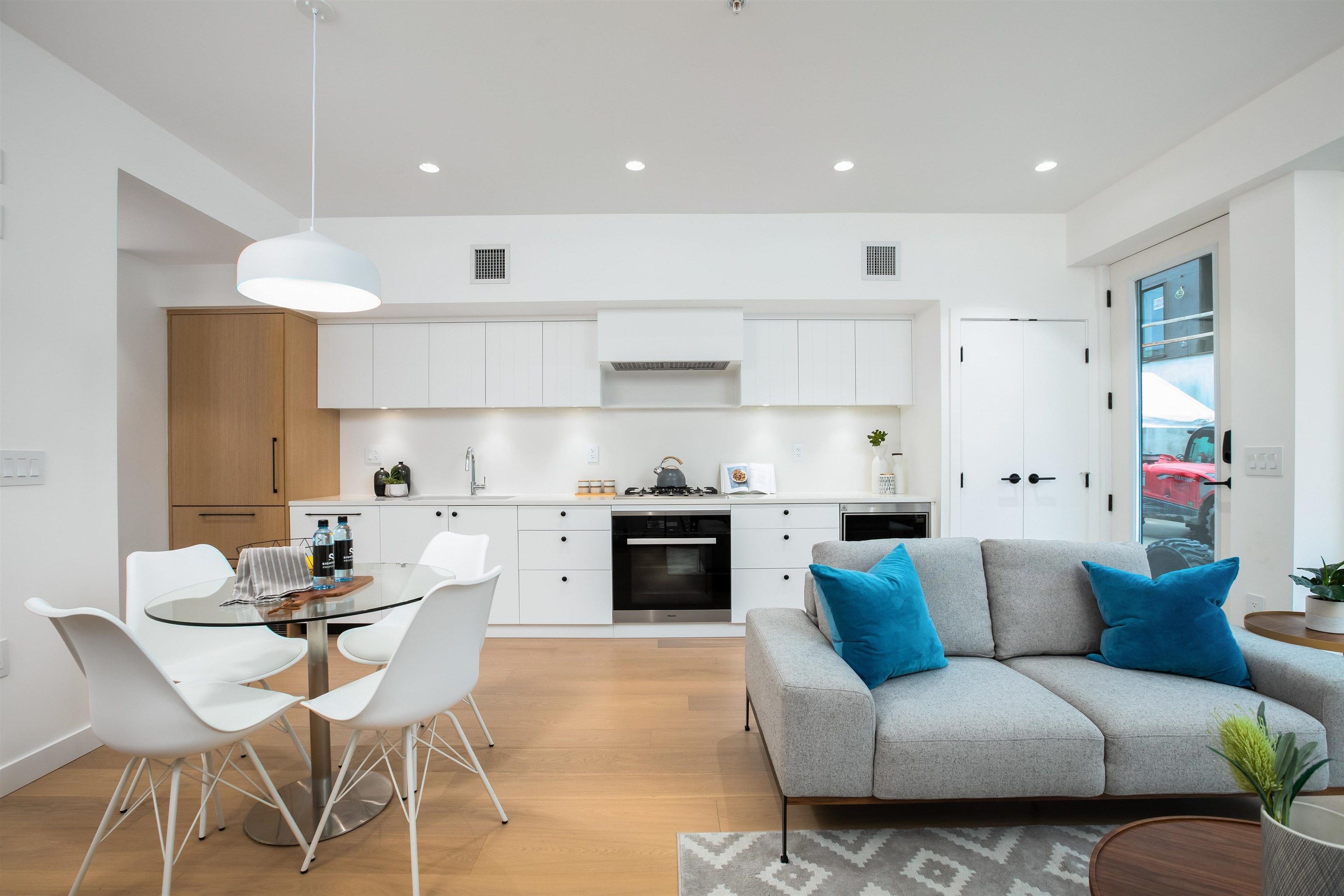 â¢ An intimate community of 51 townhomes and  garden suites intelligently designed by Shape  Architecture to maximize outdoor living and  community connections