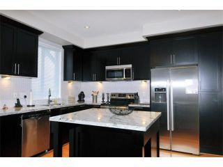 Photo 2: 115 1460 SOUTHVIEW Street in Coquitlam: Burke Mountain Townhouse for sale in "CEDAR CREEK" : MLS®# V984770