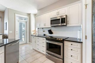 Photo 13: 54 Tuscany Village Court NW in Calgary: Tuscany Semi Detached (Half Duplex) for sale : MLS®# A2132802