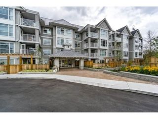 Photo 2: 103 3136 ST JOHNS Street in Port Moody: Port Moody Centre Condo for sale in "SONRISA" : MLS®# R2105055
