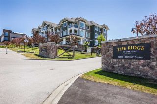 Photo 1: 215 16398 64 Avenue in Surrey: Cloverdale BC Condo for sale in "The Ridge at Bose Farm" (Cloverdale)  : MLS®# R2309894