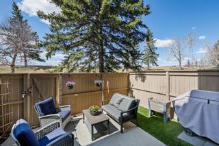 Photo 19: 52 Glamis Gardens SW in Calgary: Glamorgan Row/Townhouse for sale : MLS®# A1210536