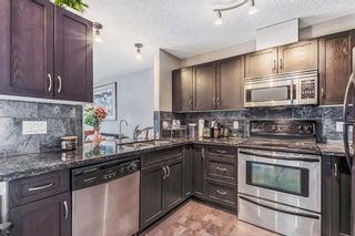 Photo 6: 10 301 Village Mews SW in Calgary: Patterson Apartment for sale : MLS®# A2099346