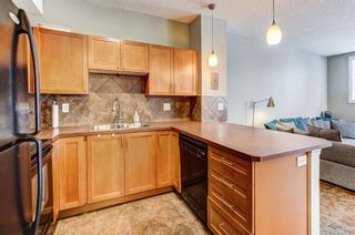 Photo 3: 105 108 Country Village Circle NE in Calgary: Country Hills Village Apartment for sale : MLS®# A2022954