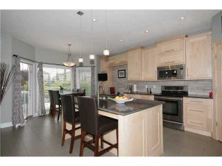 Photo 6: 224 SUNTERRA RIDGE Place: Cochrane Residential Detached Single Family for sale : MLS®# C3633482