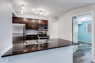Photo 9: 4106 403 Mackenzie Way SW: Airdrie Apartment for sale : MLS®# A2117904