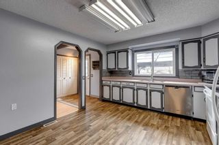 Photo 12: 115 Queensland Circle SE in Calgary: Queensland Detached for sale : MLS®# A2112471