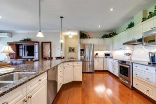Photo 4: . 1402 Lake Fraser Court SE in Calgary: Lake Bonavista Apartment for sale : MLS®# A2078635