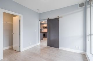 Photo 8: 411 550 Riverfront Avenue SE in Calgary: Downtown East Village Apartment for sale : MLS®# A1212416