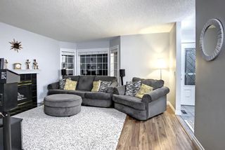 Photo 2: 100 Somerside Manor SW in Calgary: Somerset Detached for sale : MLS®# A1180043