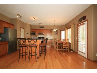 Photo 8: 18 WEST POINTE Manor: Cochrane House for sale : MLS®# C4072318