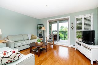 Photo 2: 206 12 LAGUNA COURT in New Westminster: Quay Condo for sale : MLS®# R2706831