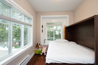 Photo 9: 101 3333 DEWDNEY TRUNK Road in Port Moody: Port Moody Centre Townhouse for sale in "CENTREPOINT" : MLS®# R2378597