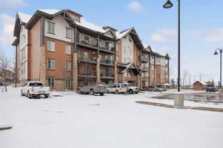 Photo 1: 3204 15 Sunset Square: Cochrane Apartment for sale : MLS®# A2129255