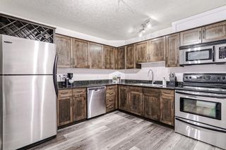 Photo 1: 204 931 2 Avenue NW in Calgary: Sunnyside Apartment for sale : MLS®# A2050012