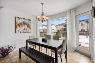 Photo 9: 28 Cougarstone Square SW in Calgary: Cougar Ridge Detached for sale : MLS®# A2036427