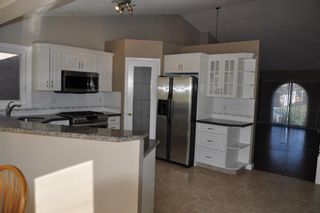 Photo 6: 103 Riverside Way SE in Calgary: Riverbend Detached for sale : MLS®# A2003343