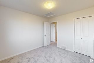Photo 24: 7301 ARMOUR Crescent in Edmonton: Zone 56 House Half Duplex for sale : MLS®# E4314626