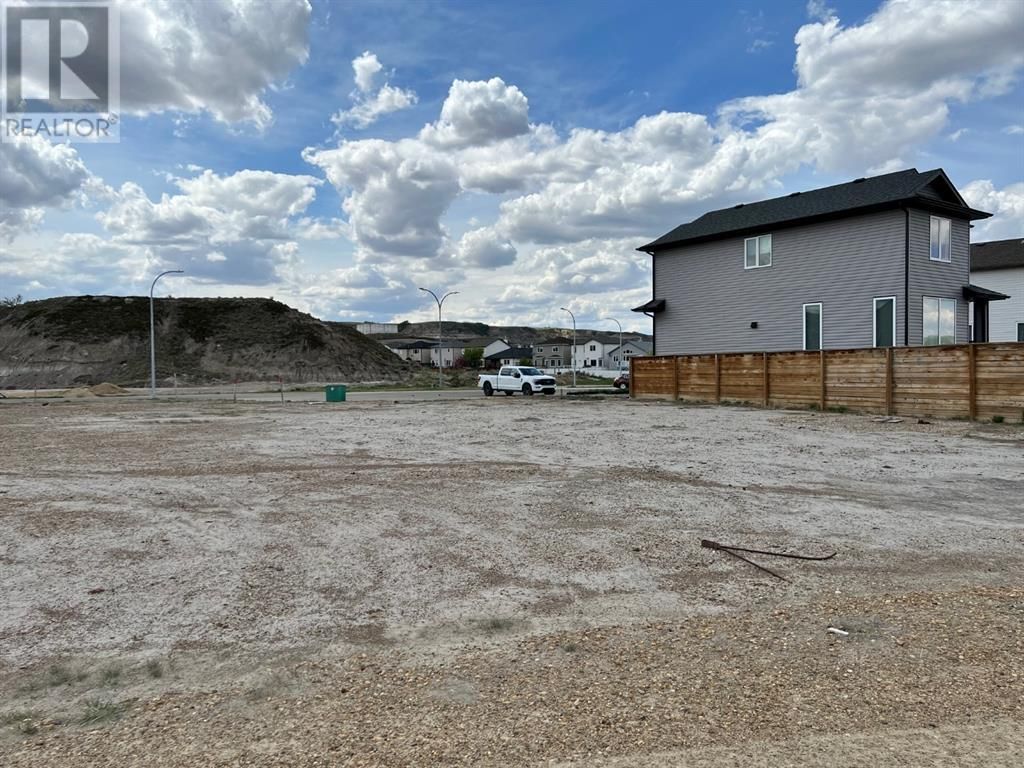 Main Photo: 144 10 Avenue SE in Drumheller: Vacant Land for sale : MLS®# A1219805