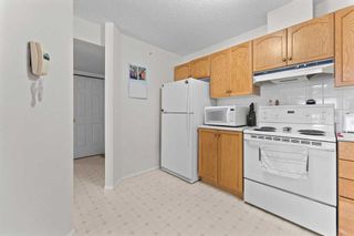Photo 4: 3415 3000 Hawksbrow Point NW in Calgary: Hawkwood Apartment for sale : MLS®# A2102212