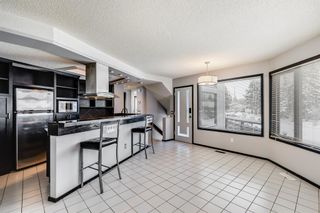 Photo 7: 4830 70 Street NW in Calgary: Bowness Detached for sale : MLS®# A2022140