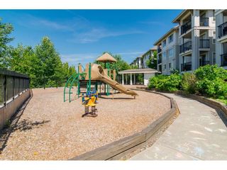 Photo 26: A107 8929 202 Street in Langley: Willoughby Heights Condo for sale in "The GROVE" : MLS®# R2468942