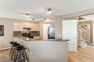 Photo 12: 2022 Bridlemeadows Manor SW in Calgary: Bridlewood Detached for sale : MLS®# A1243855