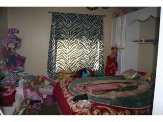 Photo 22: LEMON GROVE House for sale : 4 bedrooms : 7462 Daytona Street