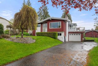 Photo 1: 19636 49 Avenue in Langley: Langley City House for sale : MLS®# R2876399
