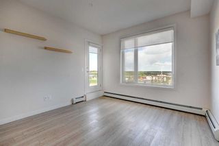 Photo 12: 107 30 Shawnee Common SW in Calgary: Shawnee Slopes Apartment for sale : MLS®# A2137358