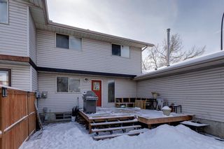 Photo 36: 322 Woodvale Crescent SW in Calgary: Woodlands Row/Townhouse for sale : MLS®# A2015272